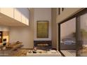 Open living space with kitchen, fireplace, and access to a patio at 4849 N Camelback Ridge Rd # A311, Scottsdale, AZ 85251