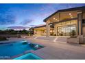Luxury home with a large backyard, pool, and stunning sunset views at 38152 N 109Th St, Scottsdale, AZ 85262