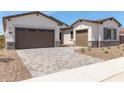 New construction home with two-car garage at 23942 N 171St Dr, Surprise, AZ 85387