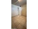 Simple bedroom with tiled floors at 121 N 28Th Ave, Phoenix, AZ 85009