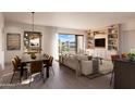 Open concept dining area with seating for six and access to a private balcony at 19355 N 73Rd Way # 3024, Scottsdale, AZ 85255