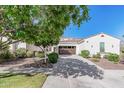 Lovely two-story home with a two-car garage and lush landscaping at 3529 N Hooper St, Buckeye, AZ 85396