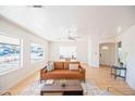 Bright living room with large windows and comfortable couch at 16410 N 32Nd Pl, Phoenix, AZ 85032