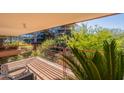 Private balcony overlooking trees and buildings at 7131 E Rancho Vista Dr # 4007, Scottsdale, AZ 85251