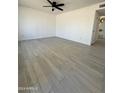 Spacious living room with wood-look tile floors at 19019 N 18Th Ave, Phoenix, AZ 85027