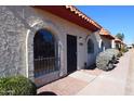 View of a stucco home with arched windows and landscaping at 9222 N 35Th Ave # 1, Phoenix, AZ 85051