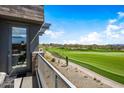Private balcony overlooking a golf course at 37200 N Cave Creek Rd # 2124, Scottsdale, AZ 85262