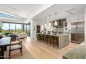 Modern kitchen with large island, marble countertops, and high-end appliances at 37200 N Cave Creek Rd # 2124, Scottsdale, AZ 85262