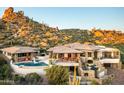 Luxury home with stunning pool and mountain views at 11070 E Rolling Rock Dr, Scottsdale, AZ 85262