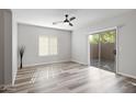 Bright bedroom with sliding door access to the backyard at 3704 W Vivian Ct, Phoenix, AZ 85086