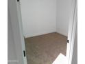Simple bedroom with brown carpet and white walls at 846 N Pueblo Dr # 137, Casa Grande, AZ 85122