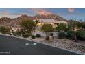 Home exterior with mountain views at 10751 E Candlewood Dr, Scottsdale, AZ 85255
