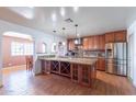 Spacious kitchen with granite countertops and wooden cabinetry at 515 E Kachina Ave, Apache Junction, AZ 85119