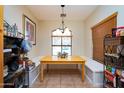 Bright breakfast nook with built-in bench seating and window at 3911 S Laurel Way, Chandler, AZ 85286