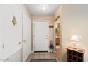 Bright entryway with tiled floor and access to other rooms at 14950 W Mountain View Blvd # 5101, Surprise, AZ 85374
