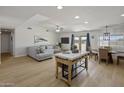 Spacious living area with light hardwood floors and access to backyard at 1505 E Cloud Rd, Phoenix, AZ 85086