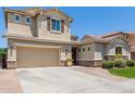 Two-story home with a large garage and attractive landscaping at 3314 E Azalea Dr, Gilbert, AZ 85298
