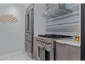 Modern kitchen with stainless steel appliances and marble countertops at 7167 E Rancho Vista Dr # 3003, Scottsdale, AZ 85251
