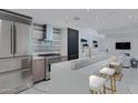Modern kitchen with an island and stainless steel appliances at 7167 E Rancho Vista Dr # 3003, Scottsdale, AZ 85251