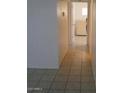 Clean hallway with tiled floors at 9627 W North Ln # B, Peoria, AZ 85345