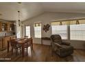 Bright dining area with wood floors and access to patio at 650 N Hawes Rd # 4956, Mesa, AZ 85207