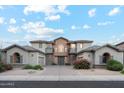 Two story home with landscaping and driveway at 3852 E Expedition Way, Phoenix, AZ 85050