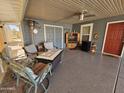 Covered patio with seating and a TV at 650 N Hawes Rd # 4507, Mesa, AZ 85207