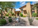 Charming two-story home with desert landscaping at 38749 N 104Th Way, Scottsdale, AZ 85262