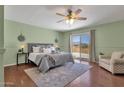 Main bedroom with access to backyard and mountain views at 16002 E El Lago Blvd, Fountain Hills, AZ 85268