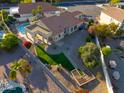 Backyard aerial view showing pool, patio, and landscaping at 1247 E Marketplace Se Way, Phoenix, AZ 85048