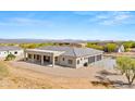 Back exterior with covered patio and mountain views at 16016 E Bobwhite Way, Scottsdale, AZ 85262