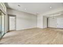 Spacious living room with tile flooring and access to patio at 19003 W Lawrence Rd, Waddell, AZ 85355