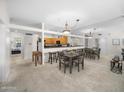 Dining area with kitchen and living room view at 7700 E Gainey Ranch Rd # 103, Scottsdale, AZ 85258