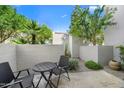 Private patio with seating area and desert plants at 7700 E Gainey Ranch Rd # 103, Scottsdale, AZ 85258