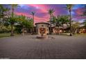 Circular driveway with fountain and palm trees at 3831 E Huber St, Mesa, AZ 85205