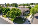 Single story home with a private backyard and driveway at 1920 E Schooner Ct, Gilbert, AZ 85234