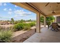 Covered patio with mountain views and comfortable seating at 550 S Lincoln St, Wickenburg, AZ 85390