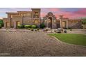 Stunning home with a stone facade and manicured landscaping at 6215 E Turquoise Ave, Paradise Valley, AZ 85253