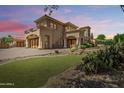 Beautiful two story home with a manicured lawn at 6215 E Turquoise Ave, Paradise Valley, AZ 85253