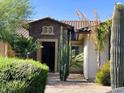 Inviting curb appeal with stone accents and desert landscaping at 20371 E Calle De Flores --, Queen Creek, AZ 85142