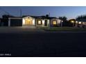 Updated home exterior at night, showcasing curb appeal at 2303 W Marshall Ave, Phoenix, AZ 85015