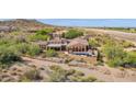 Single-story home with a pool and desert landscape views at 7260 E Eagle Crest Dr # 19, Mesa, AZ 85207