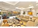 Spacious living area with modern furniture and large windows at 7137 E Rancho Vista Dr # 7008, Scottsdale, AZ 85251