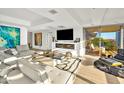 Open living space featuring a fireplace and city views at 7137 E Rancho Vista Dr # 7008, Scottsdale, AZ 85251