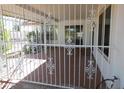 Enclosed patio with tile flooring at 9867 W Roundup Ct, Sun City, AZ 85373