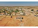 Aerial view of a single-story home on a spacious lot at 22378 W Gamble Ln, Wittmann, AZ 85361