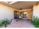 Covered patio with tile flooring and seating area at 4525 N 66Th St # 70, Scottsdale, AZ 85251