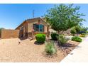 One story home with attached garage and landscaping at 20051 N Herbert Ave, Maricopa, AZ 85138