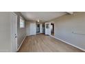 Bright and airy living room with light flooring and neutral walls at 5480 E Boston St, Mesa, AZ 85205