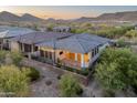 Aerial view of home showcasing backyard patio and landscape at 11983 W Creosote Dr, Peoria, AZ 85383